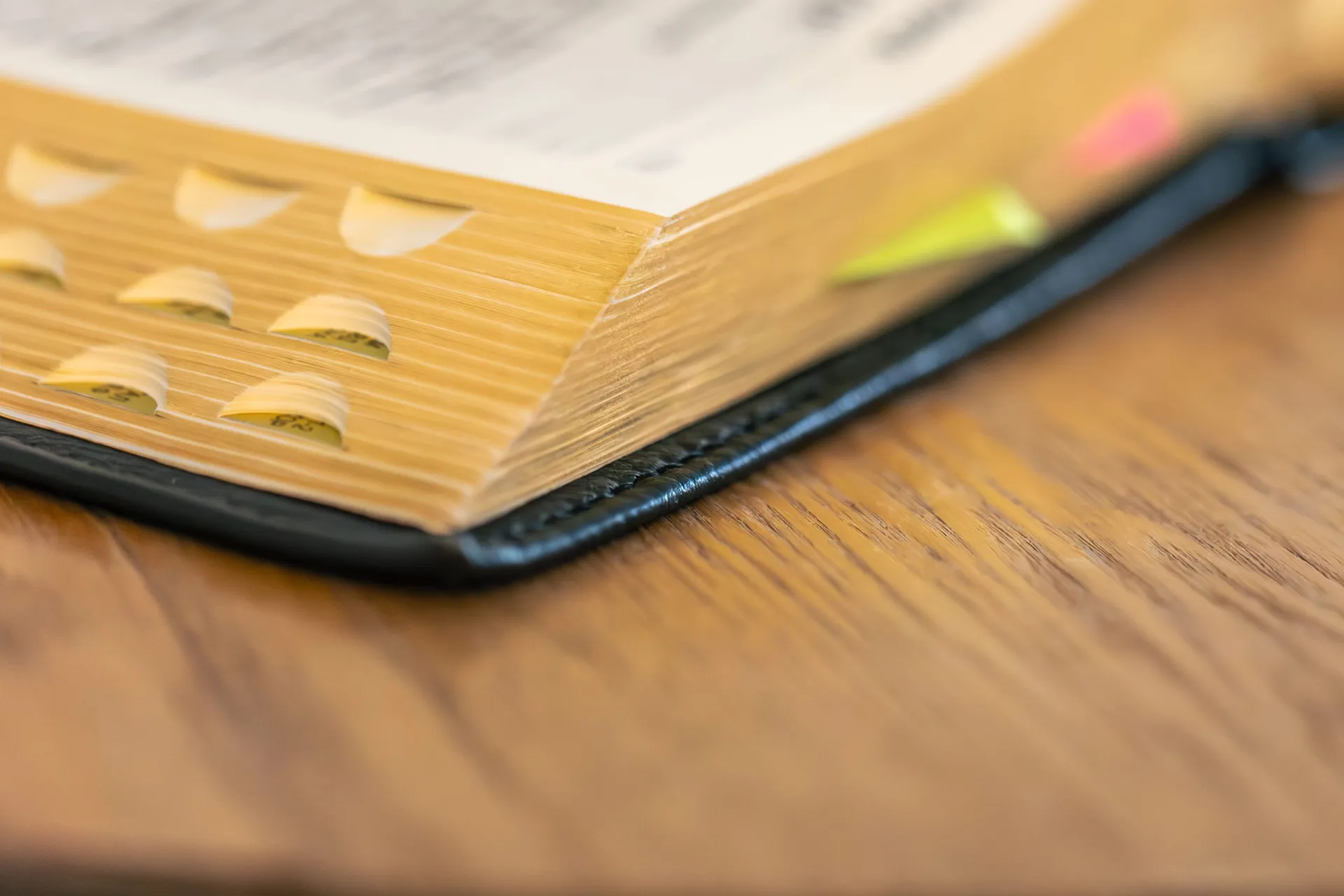 golden-bible-pages-with-tabs-minimalist-soft-light-bible-minimalism-scaled
